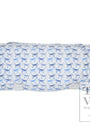 Folded fabric nap mat with blue dog pattern on a white background