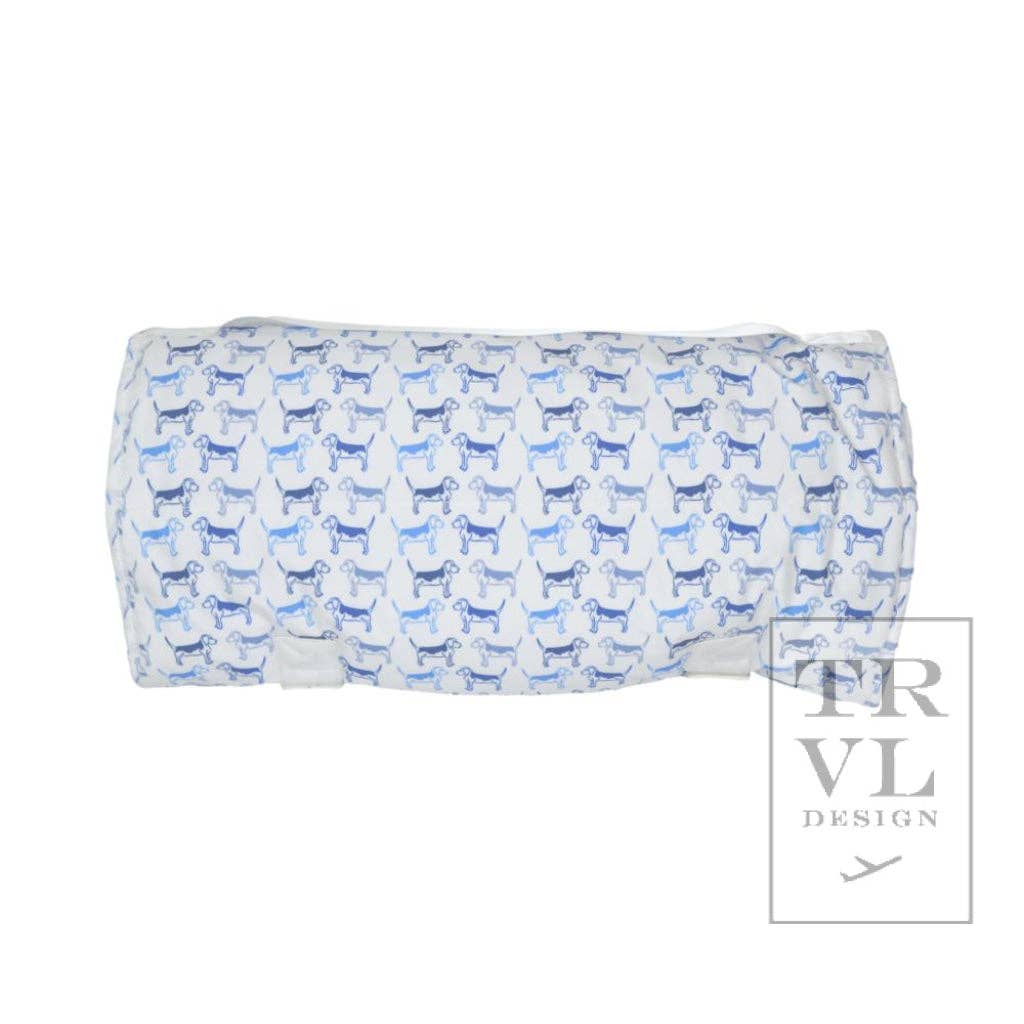 Folded fabric nap mat with blue dog pattern on a white background