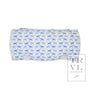 Folded fabric nap mat with blue dog pattern on a white background