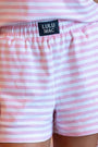 Pink and white striped shorts with a visible Lulu Mac label.