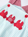 Striped fabric with red crab appliqués and buttons on a white background