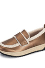 A single slip-on loafer-style shoe in metallic bronze with a thick cream shearling lining and a black treaded sole, shown on a plain white background.