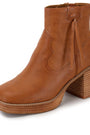 A single brown leather ankle boot with a stacked wood-look block heel, platform sole, and decorative stitching, shown on a plain white background.