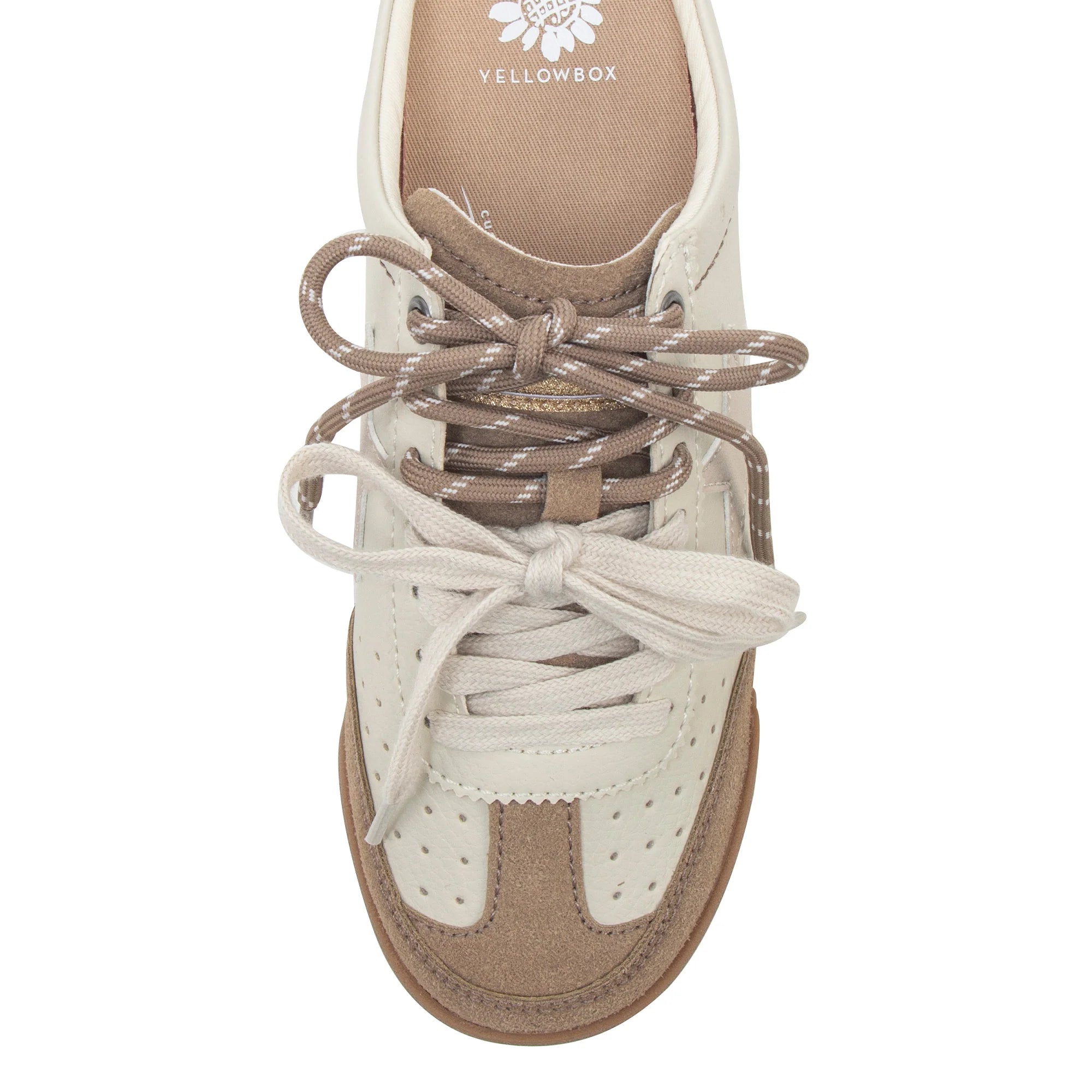 Top-down view of a low-top sneaker in off-white and tan, featuring metallic taupe laces and a tan rubber toe cap, with the Yellowbox logo printed on the inner lining.