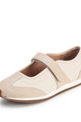 Beige shoe with a strap on a white background