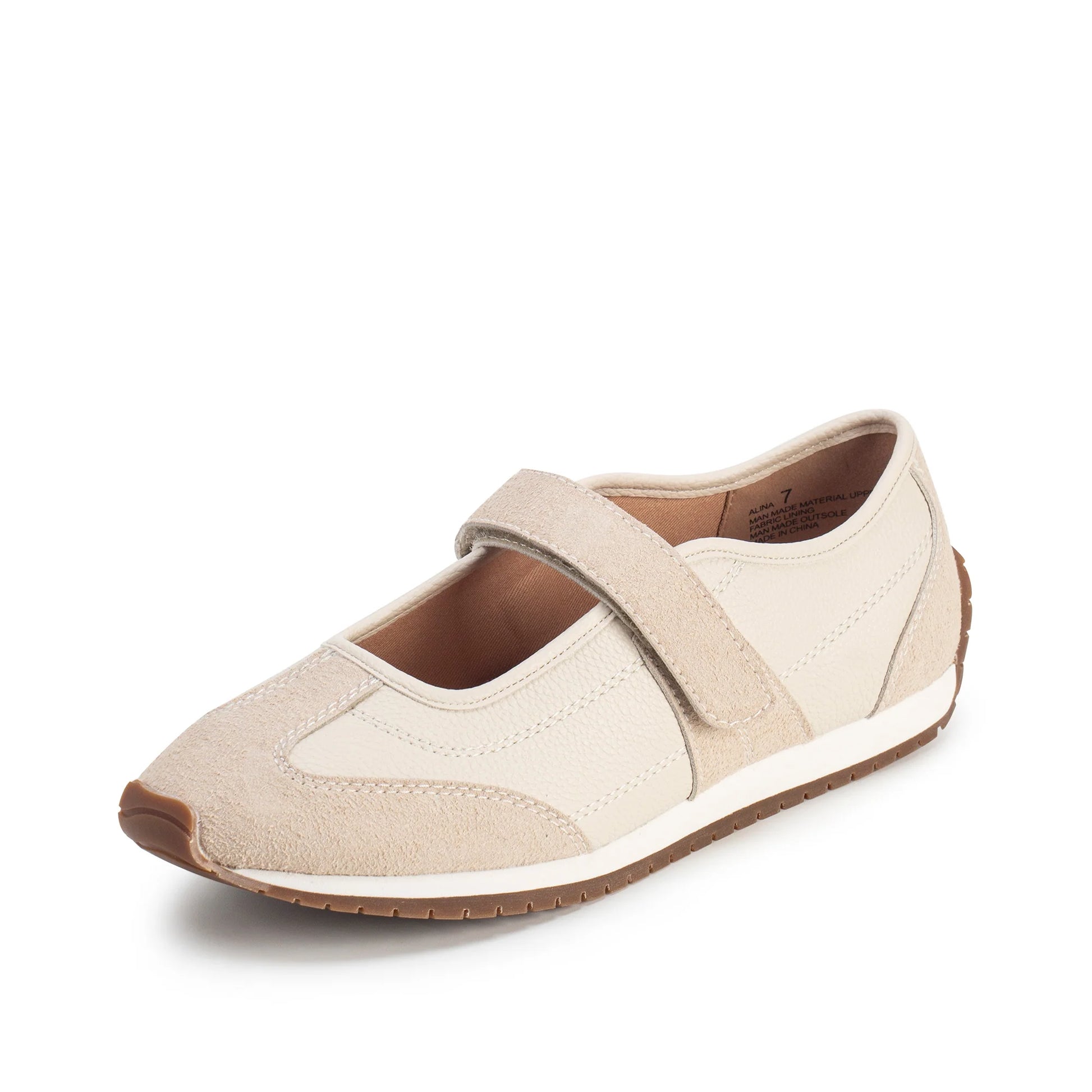 Beige shoe with a strap on a white background