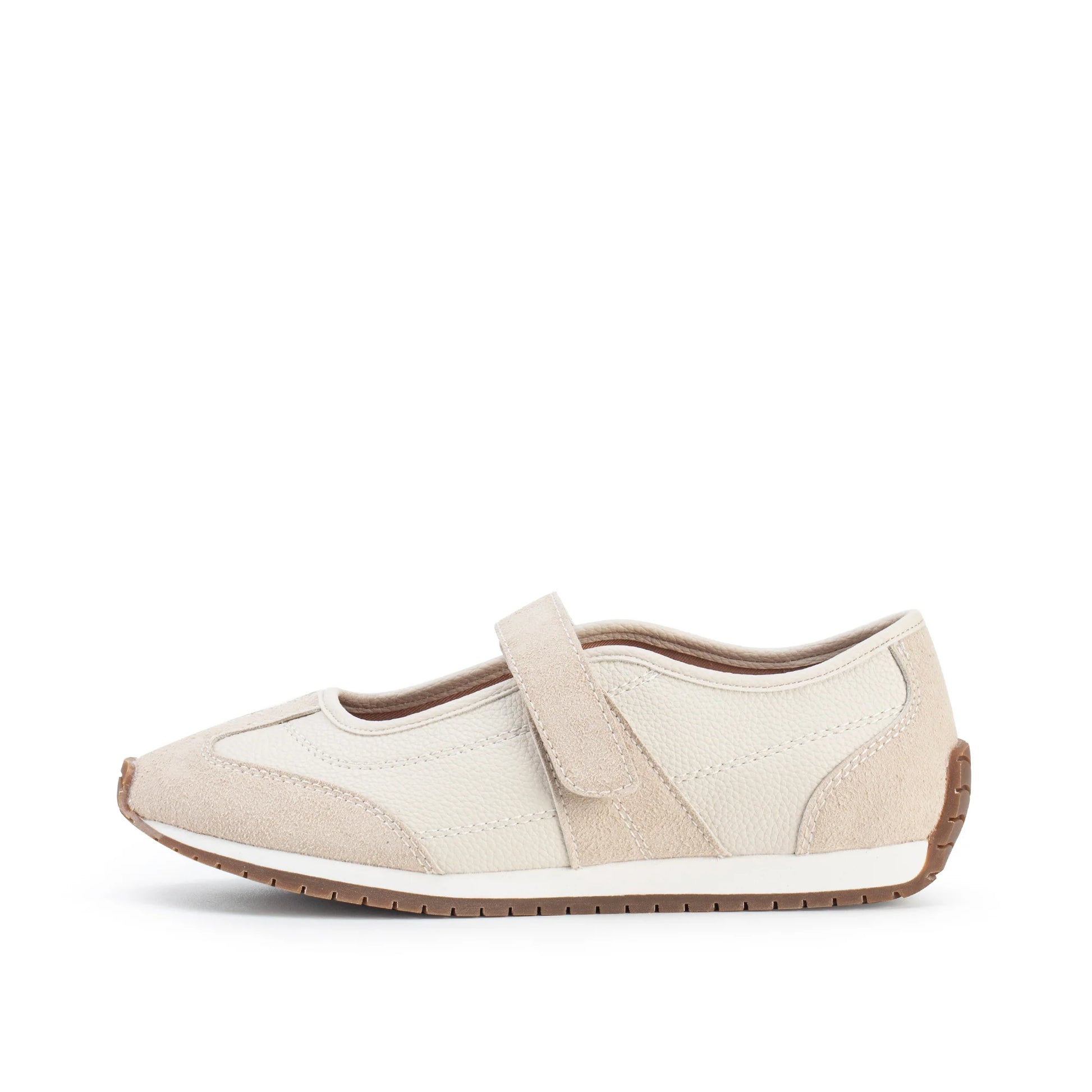 Beige sneaker with a strap on a white background