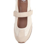 A single cream-colored Mary Jane shoe with a hook-and-loop strap, shown from a top-down view on a white background. The brand name 'YELLOWBOX' is visible on the insole.