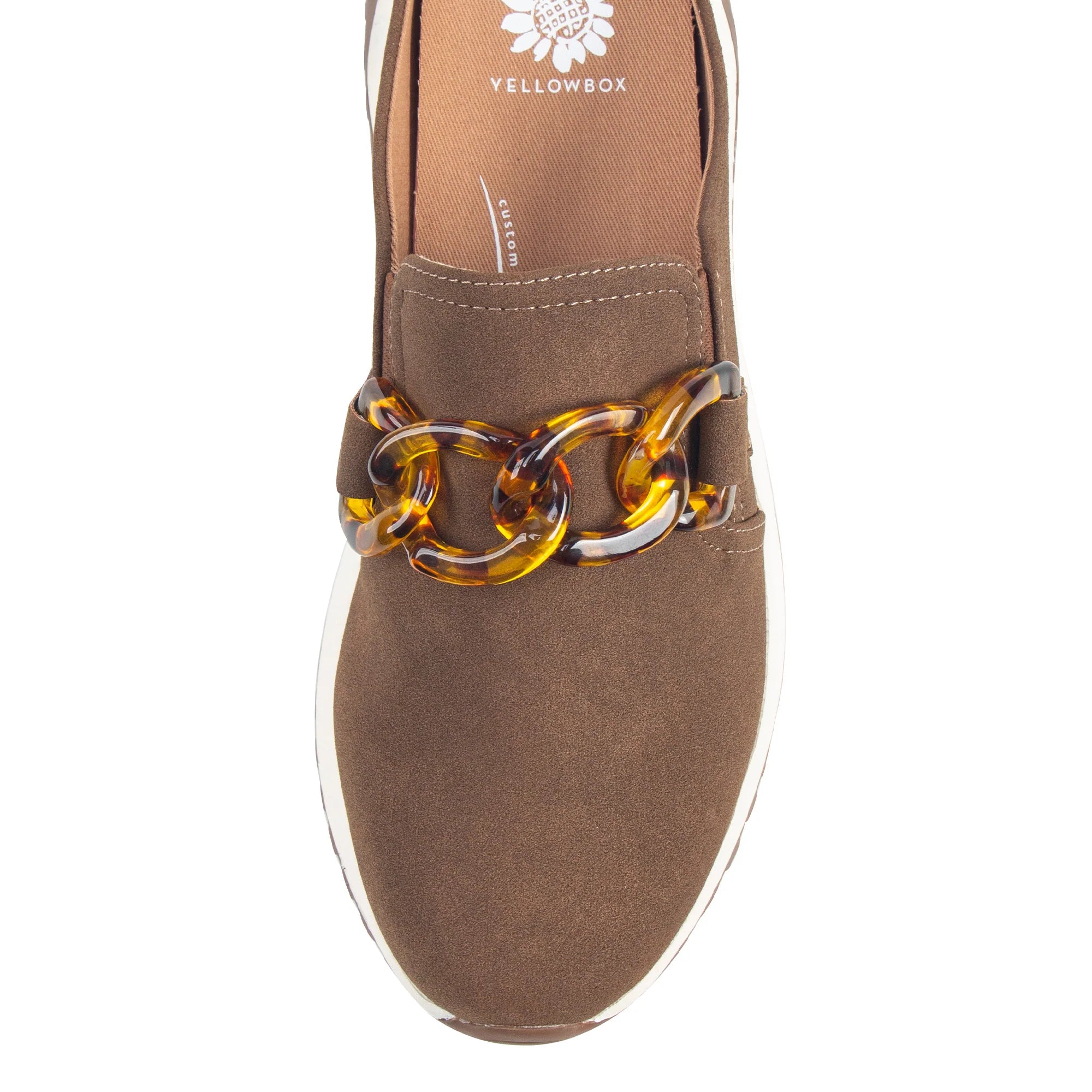Brown loafer shoe with tortoiseshell chain detail on a white background, featuring Yellowbox branding.