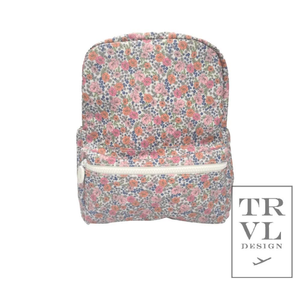 Floral patterned backpack with 'TRVL Design' logo on a white background