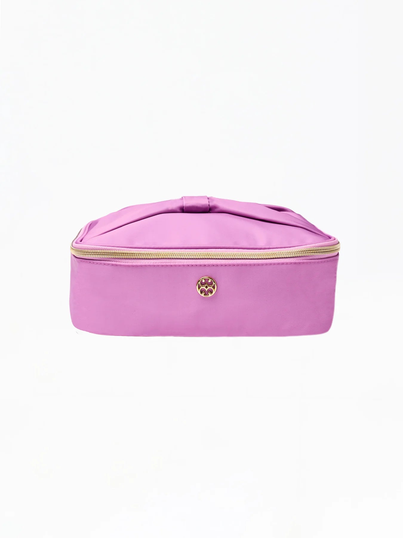 Pink cosmetic case with gold zipper on a white background