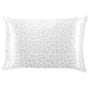 White pillowcase with subtle pattern on a white background