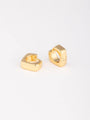 Gold hoop earrings on a white background