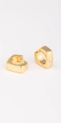 Gold hoop earrings on a white background