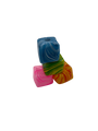 Three colorful marbled soap bars on a white background