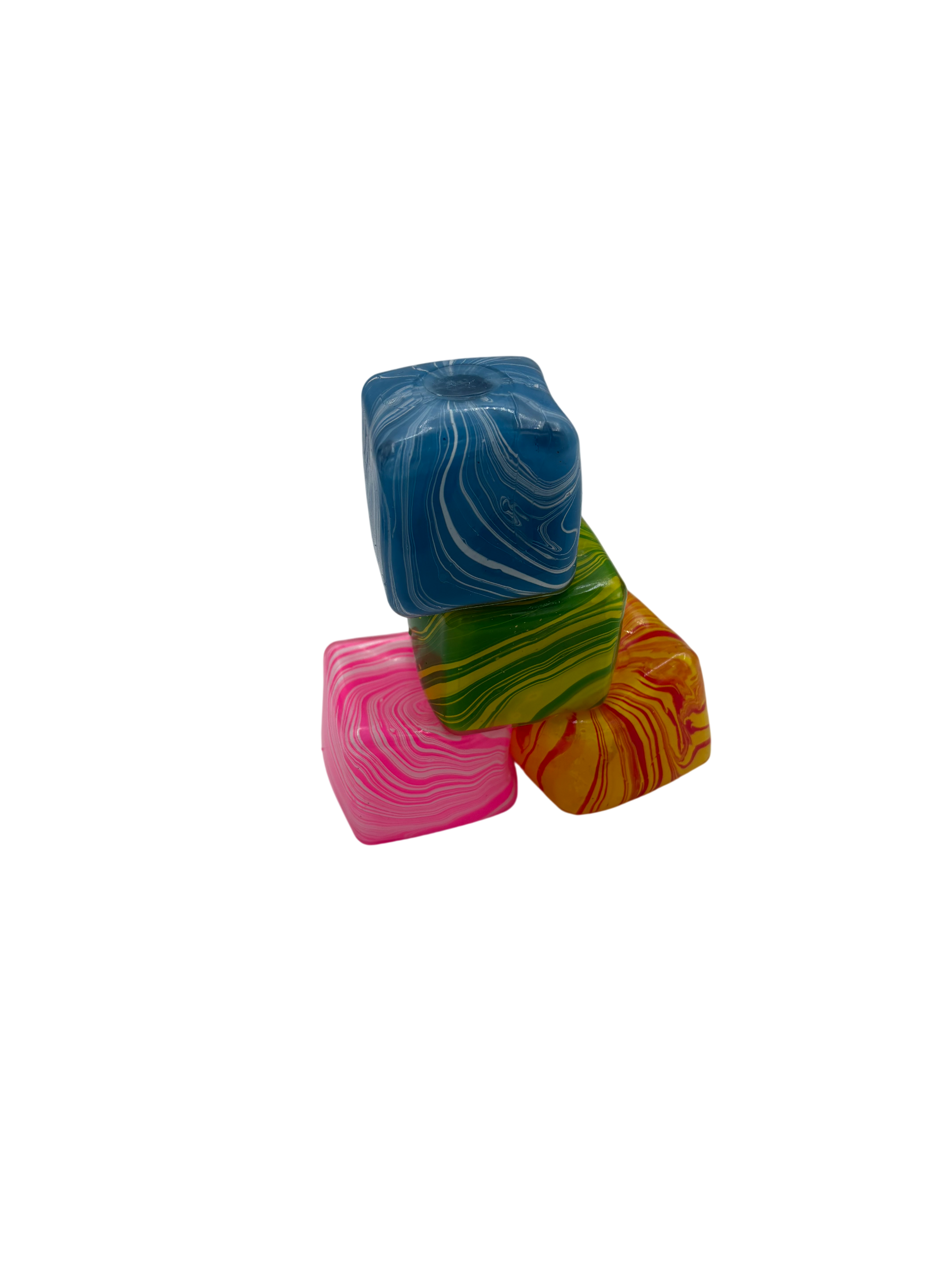 Three colorful marbled soap bars on a white background