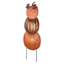 A decorative stacked pumpkin garden stake featuring three metallic bronze and orange pumpkins on thin black metal legs, shown against a plain white background.