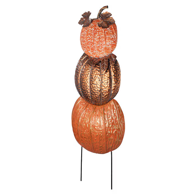 A decorative stacked pumpkin garden stake featuring three metallic bronze and orange pumpkins on thin black metal legs, shown against a plain white background.