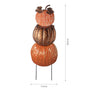 A decorative stack of three faux pumpkins on a metal stake, shown with dimension arrows and labels indicating 38.0 inches tall and 13.