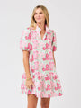 Woman wearing a floral dress on a white background