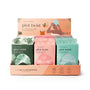 Display of Lemon Lavender plot twist products with colorful packaging on a white background