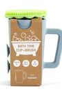 Bath time cup and brush set with packaging on a white background