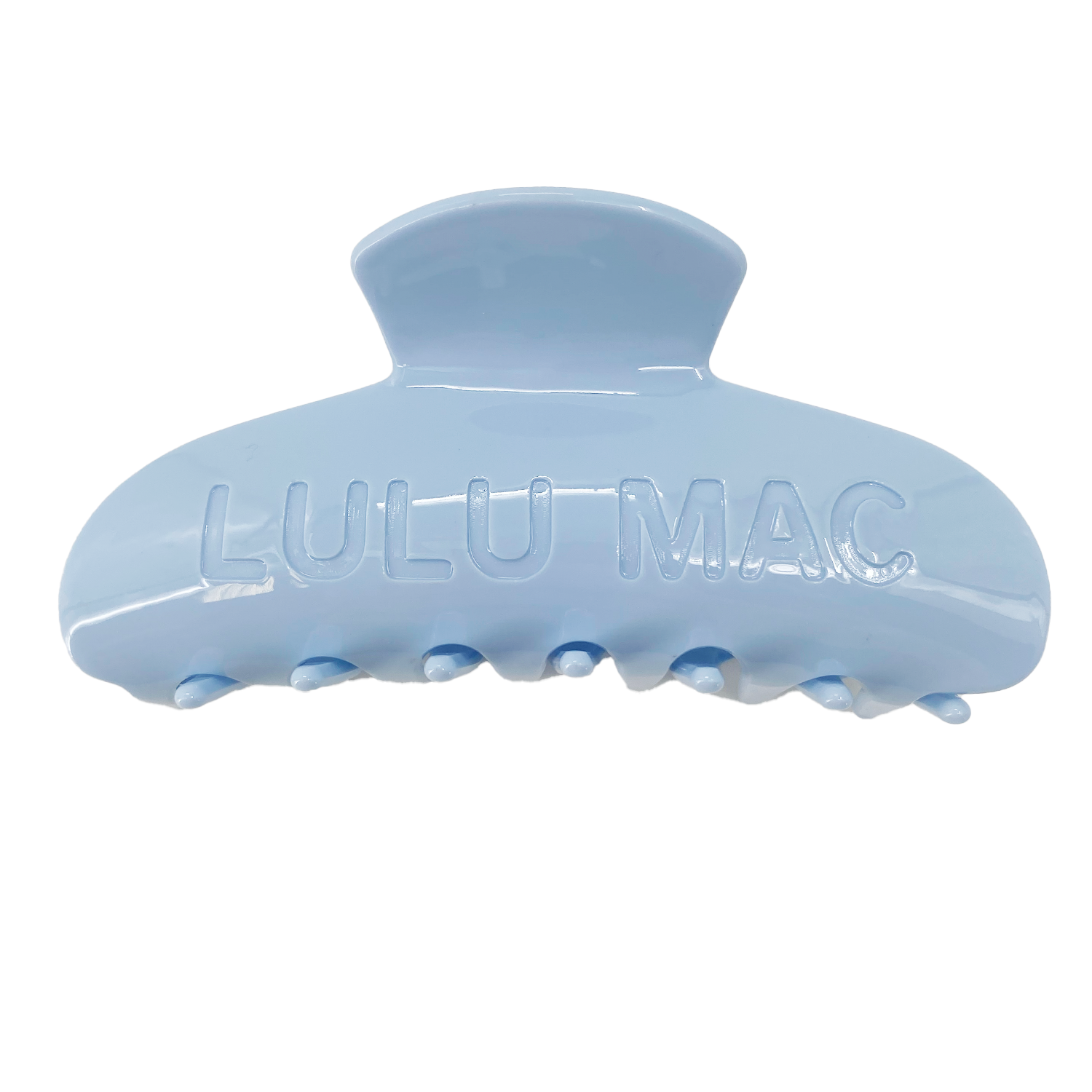 Light blue hair clip on a white background