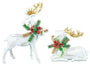 2 Decorative reindeer figurines with gold antlers and festive wreaths on a white background