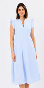 Woman wearing a light blue dress on a white background