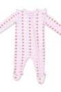 A baby footed sleeper in light pink with vertical stripes of small brown teddy bears and white bunny silhouettes, featuring a front zipper.