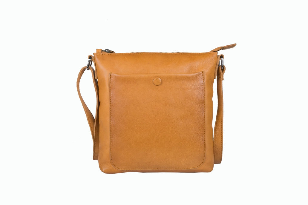 Brown leather crossbody bag on a white background