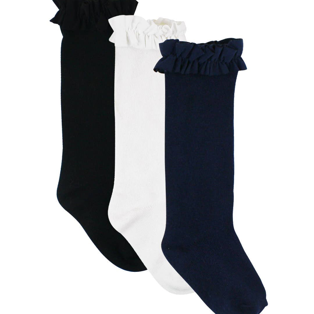 Three pairs of socks in black, white, and navy with ruffled tops on a white background.