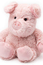 Pink plush pig toy on a white background