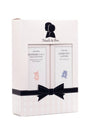 Noodle & Boo baby product set packaging with two bottles and a black bow on a white background