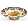 Decorative ceramic plate with a turkey design on a white background