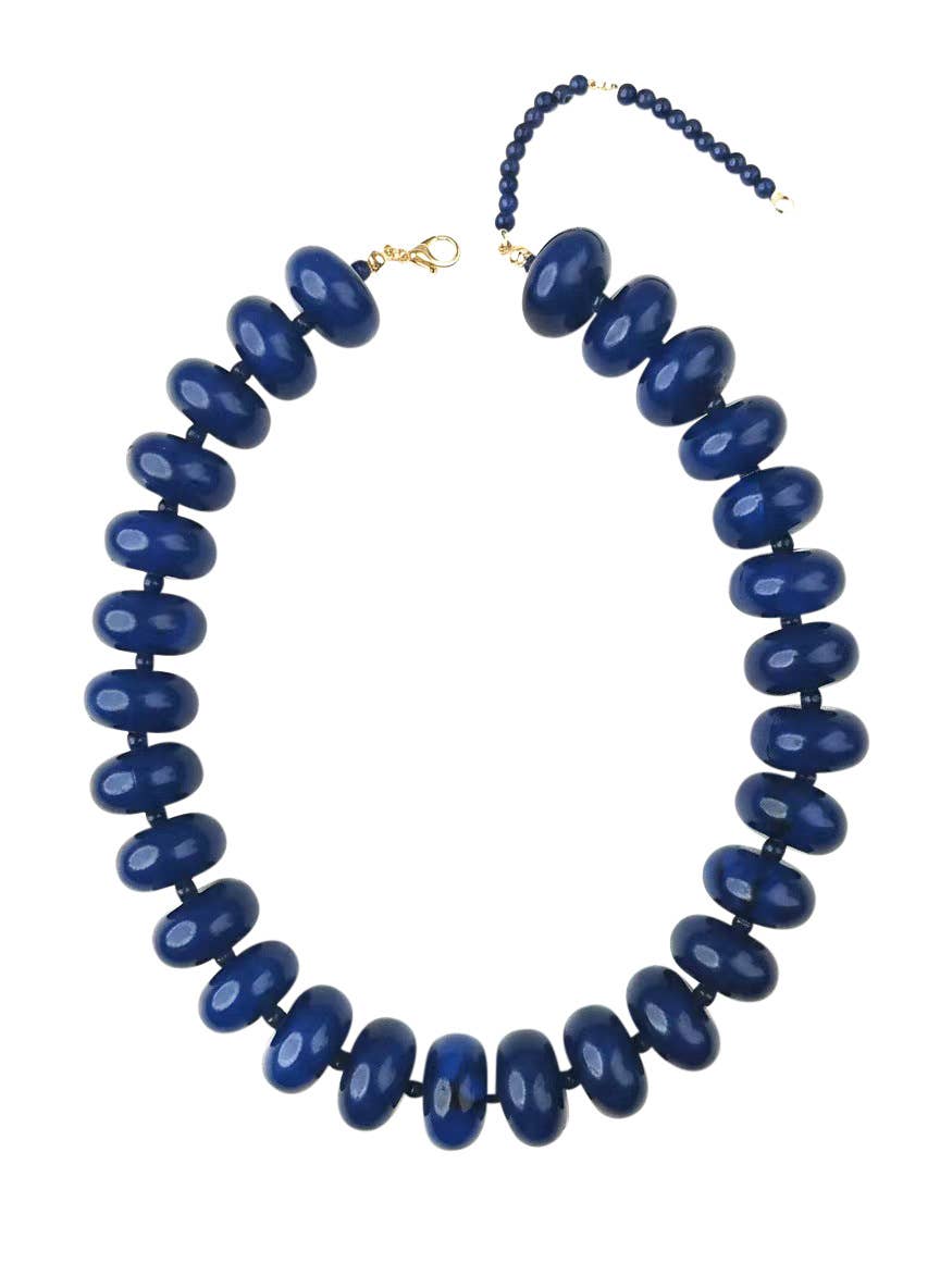 Chunky beaded necklace with dark navy oval beads and gold clasp