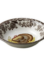 Decorative ceramic bowl with a turkey design on a white background