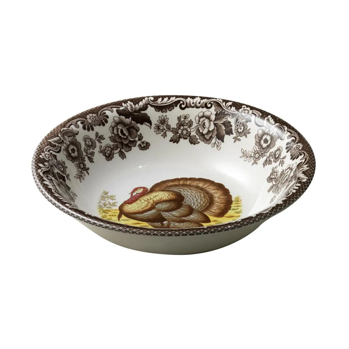 Decorative ceramic bowl with a turkey design on a white background