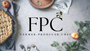 Apple pie, apples, and greenery on a table with 'FPC' branding.