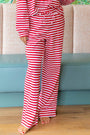 Red and white striped lounge pants with elastic waistband and cuffed ankles