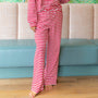 Red and white striped lounge pants with elastic waistband and cuffed ankles