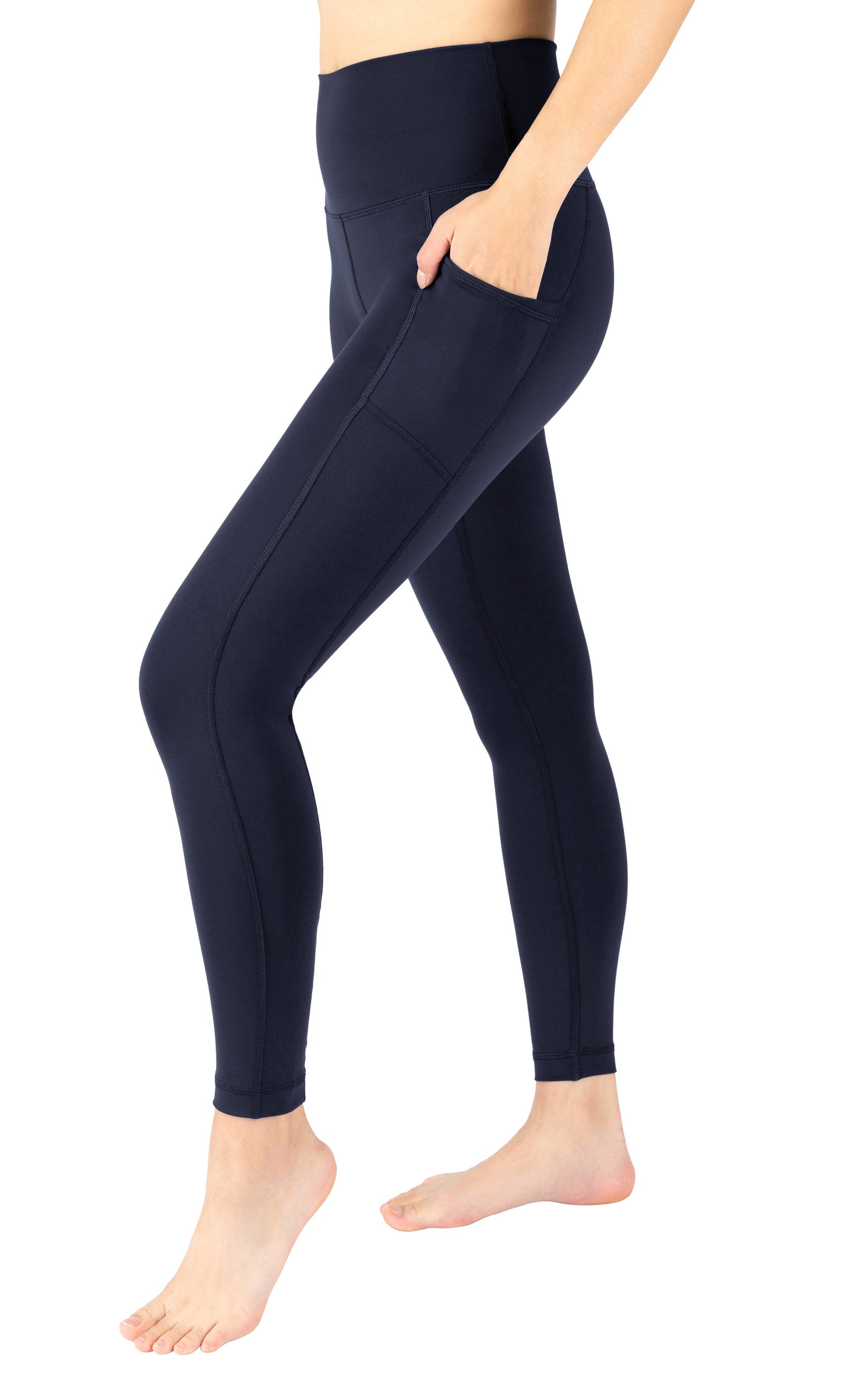 Black leggings worn by a person on a white background