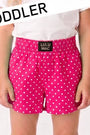 Pink polka dot shorts with Lulu Mac label on a white background