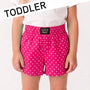 Pink polka dot shorts with Lulu Mac label on a white background