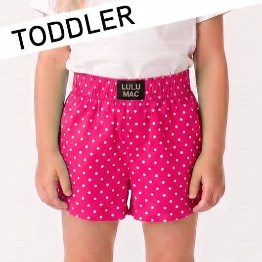 Pink polka dot shorts with Lulu Mac label on a white background
