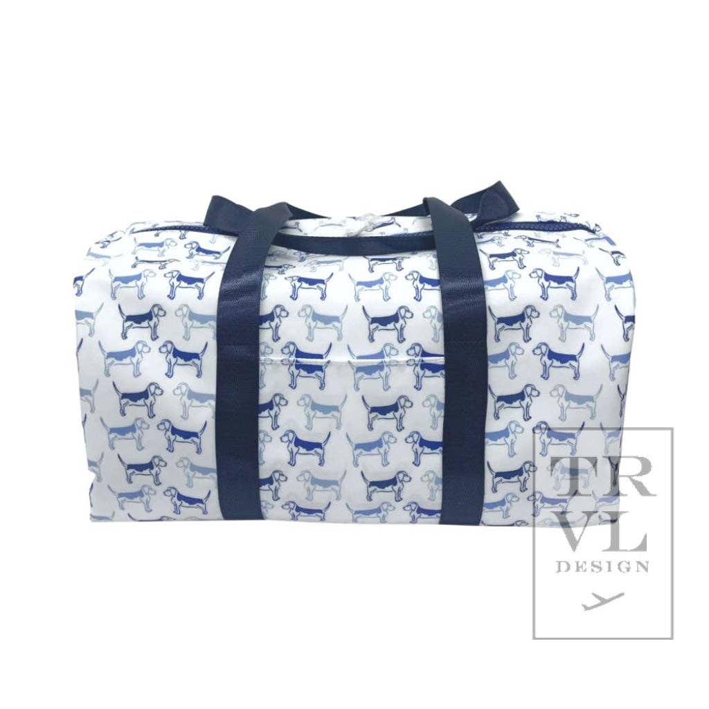 Duffle bag with dog pattern and navy straps on a white background, featuring the brand 'RVL Design'.