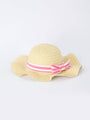 Beige straw hat with a pink and white striped band on a light gray background