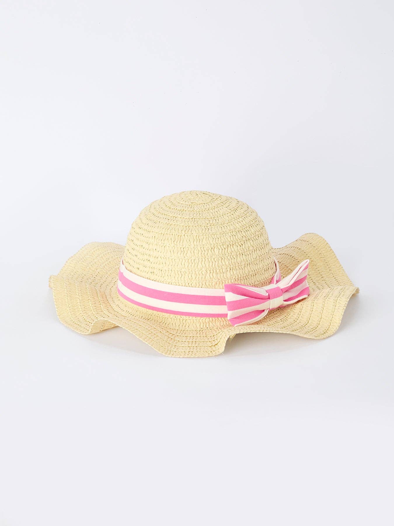 Beige straw hat with a pink and white striped band on a light gray background