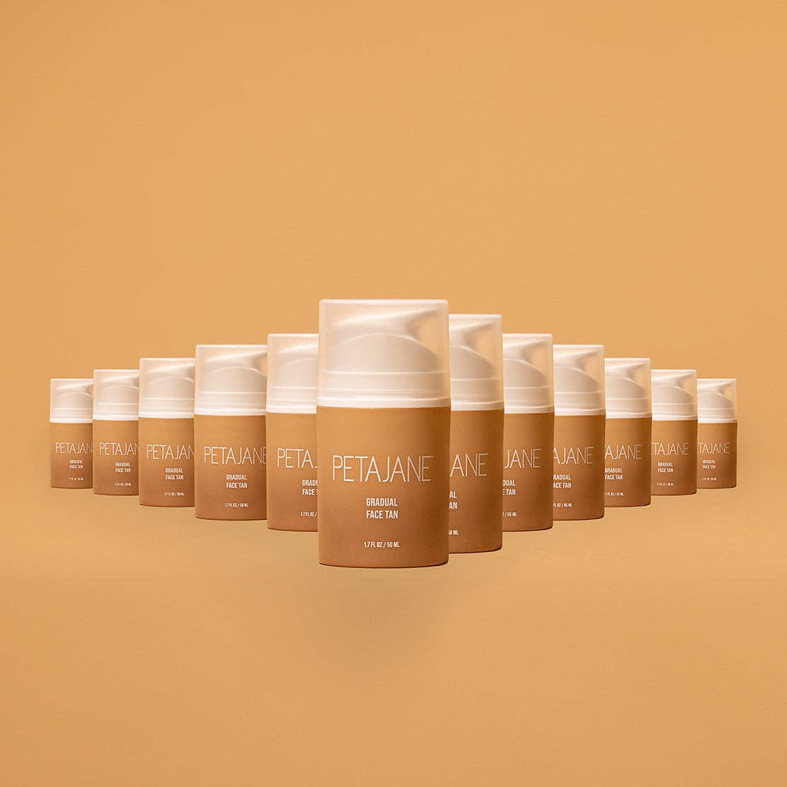 Row of Peta Jane sunless tanning products on a matching brown background