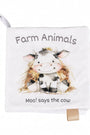 Soft crinkle cloth baby book cover with farm animal cow illustration and fabric tags